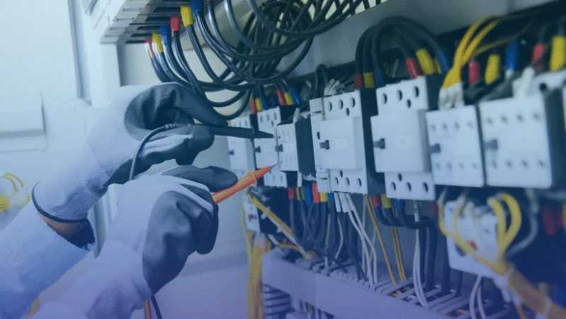 Professional electrician performing electrical repair work